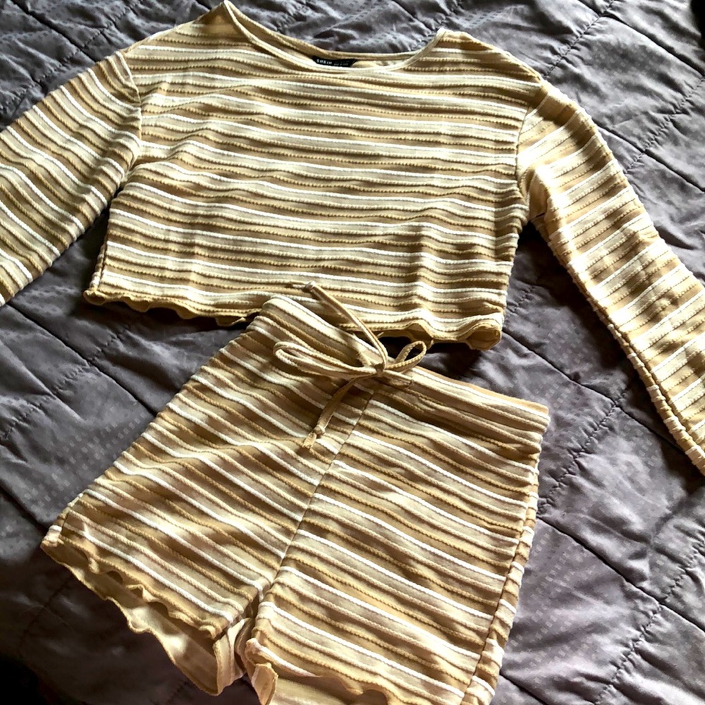 NWOT top is size small and shorts are an xs